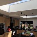 Stunning finished open plan kitchen with a pair of roof lights